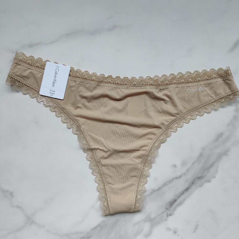 NWT CALVIN KLEIN FLIRTY MICRO THONG PANTY IN DESERT SIZE LARGE